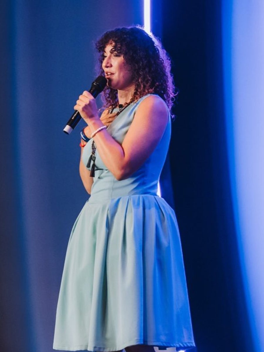 Sophia Lee Fox speaking on stage
